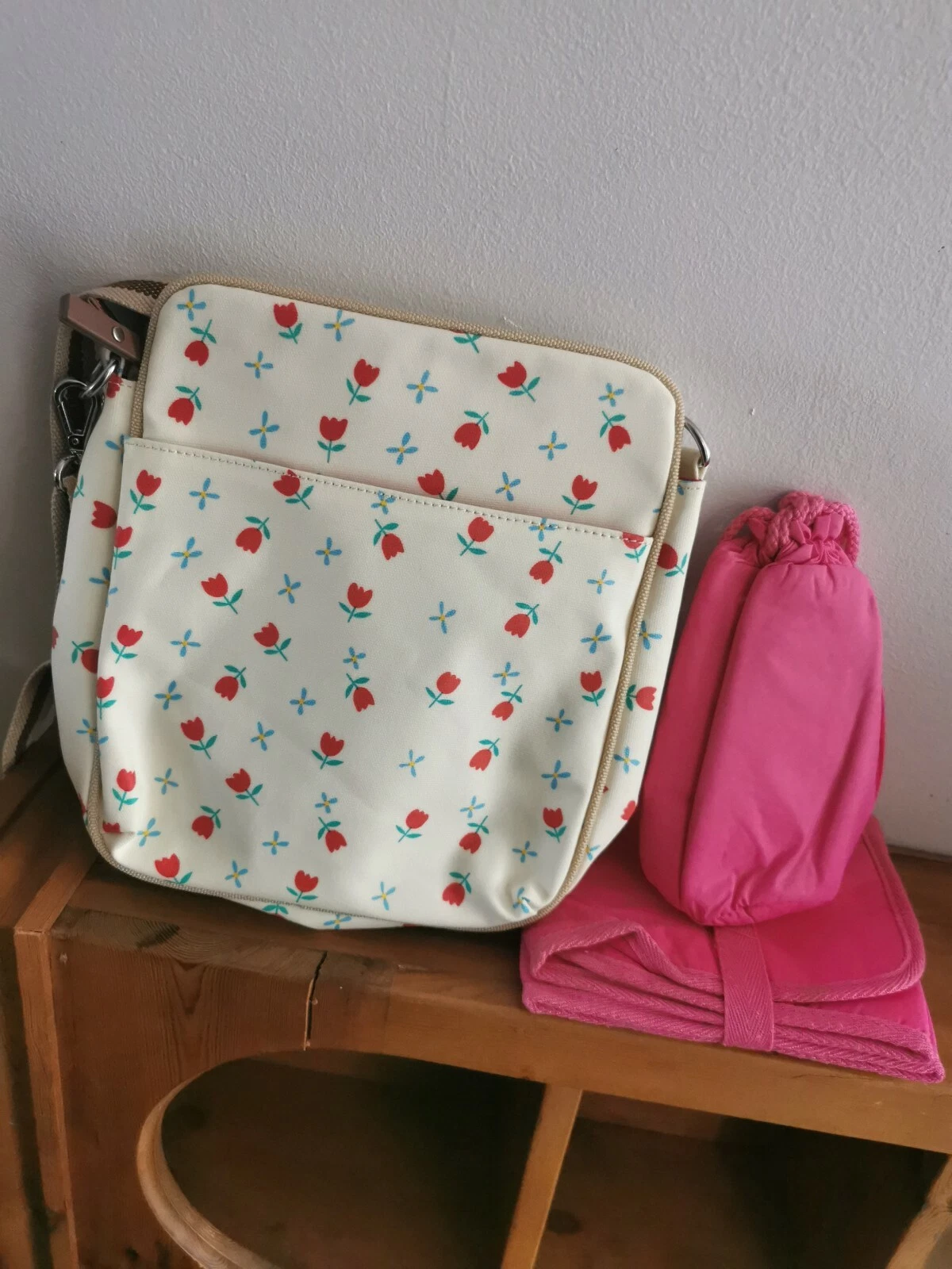 Pink lining Out & About Mini Baby Bag changing Mat Bottle Bag Tulip Design