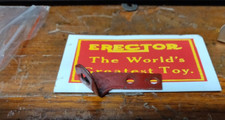 1 VERY EARLY STEERING COLUMN BRACKET "LX" A.C. GILBERT ERECTOR SET RED PAINT