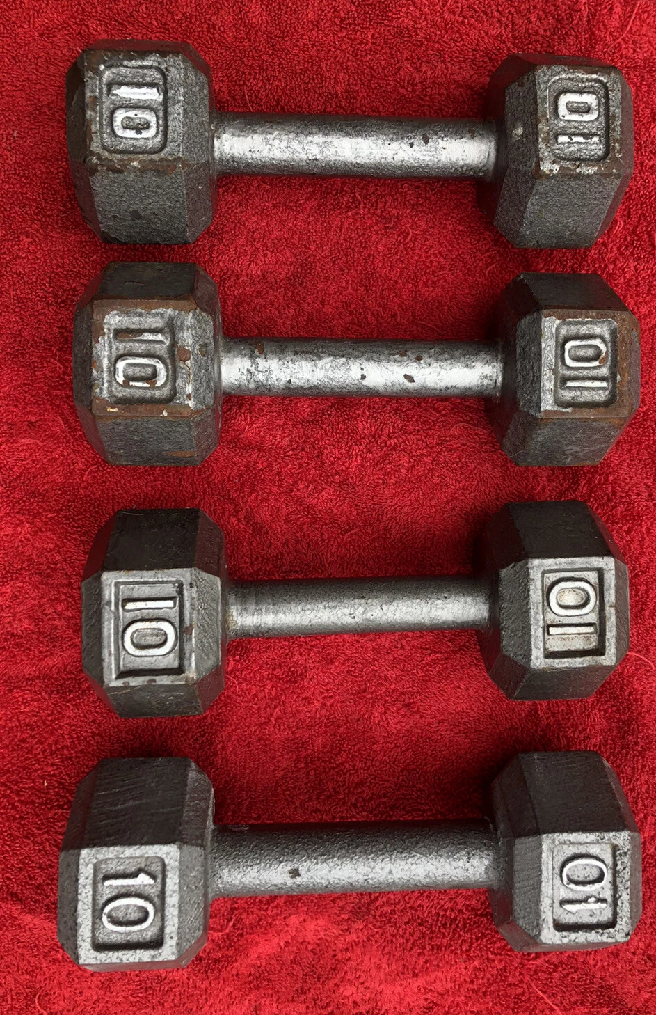 Four 10 Pound Cast Iron Hex Dumbbells