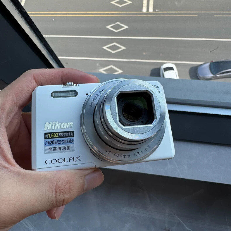 Nikon COOLPIX S7000 16.0MP 20x Optical Zoom Digital Camera English