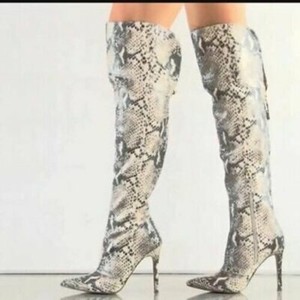thigh high snakeskin boot