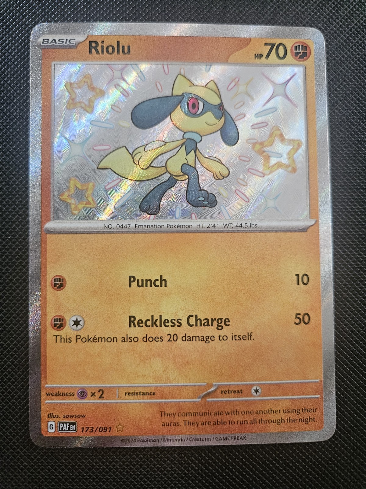 Riolu 173/091 SV: Paldean Fates Holo Shiny Rare NM Pokemon Card 2024