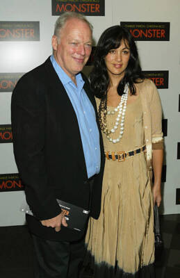 David Gilmour and wife journalist Polly Samson arrive at the UK p- 2004 Photo 1