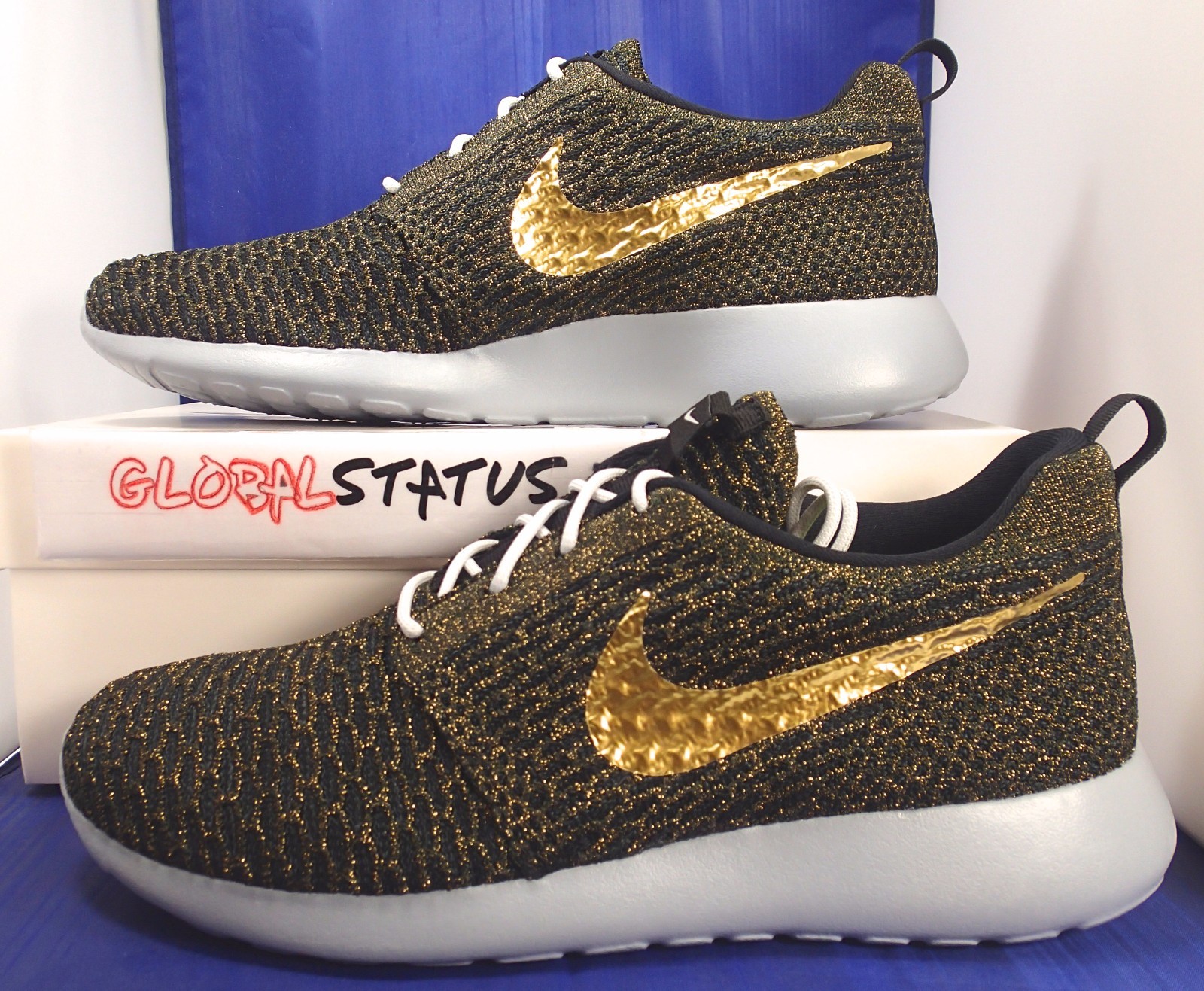nike roshe one black and gold