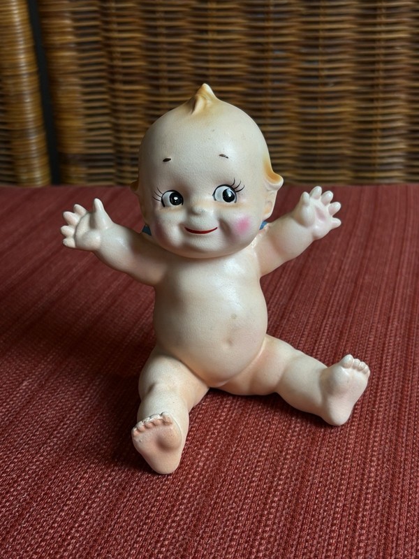 Vintage Porcelain Sitting Copyright Rose O’Neil Kewpie Doll  5” Tall