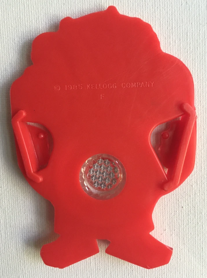 De colección 1985 Kellogg Cereal Premium Bicicleta Reflector Rojo y Blanco Robot Transformador Foto 2 de 2