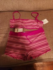 2 PC Sunrays bathing suit. Top size 9, bottom size 11.