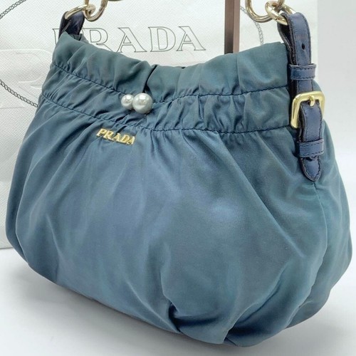 Sac à main Prada nylon cuir métal logo poignées usine tressées bleu vert foncé occasion