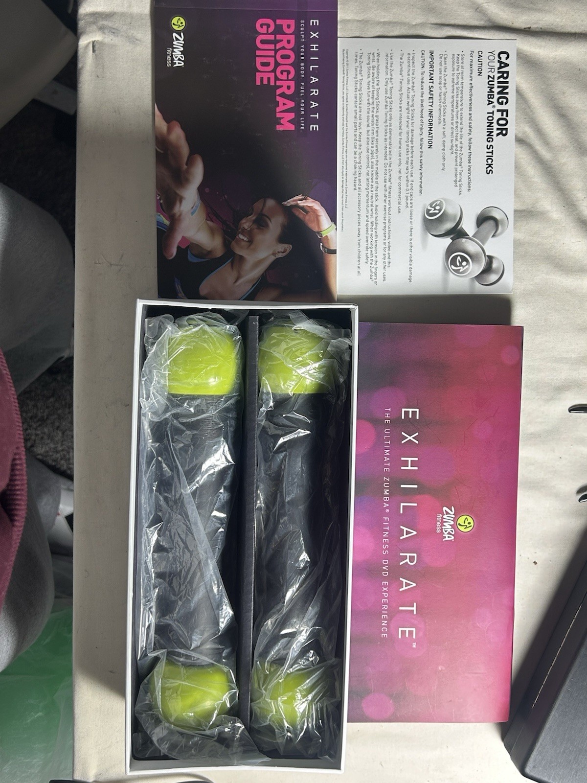 Zumba Fitness Exhilarate: The Ultimate Zumba Fitness DVD Set W/ Toning Sticks