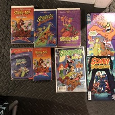 Scooby-Doo Lot Of Seven, Three VHS Tapes And Comics And One Dvd