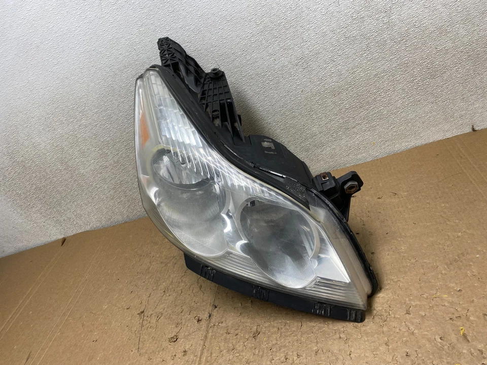 Faro halógeno para pasajero derecho Chevrolet Traverse 2009 a 2012 OEM V3819 DW Foto 2 de 4