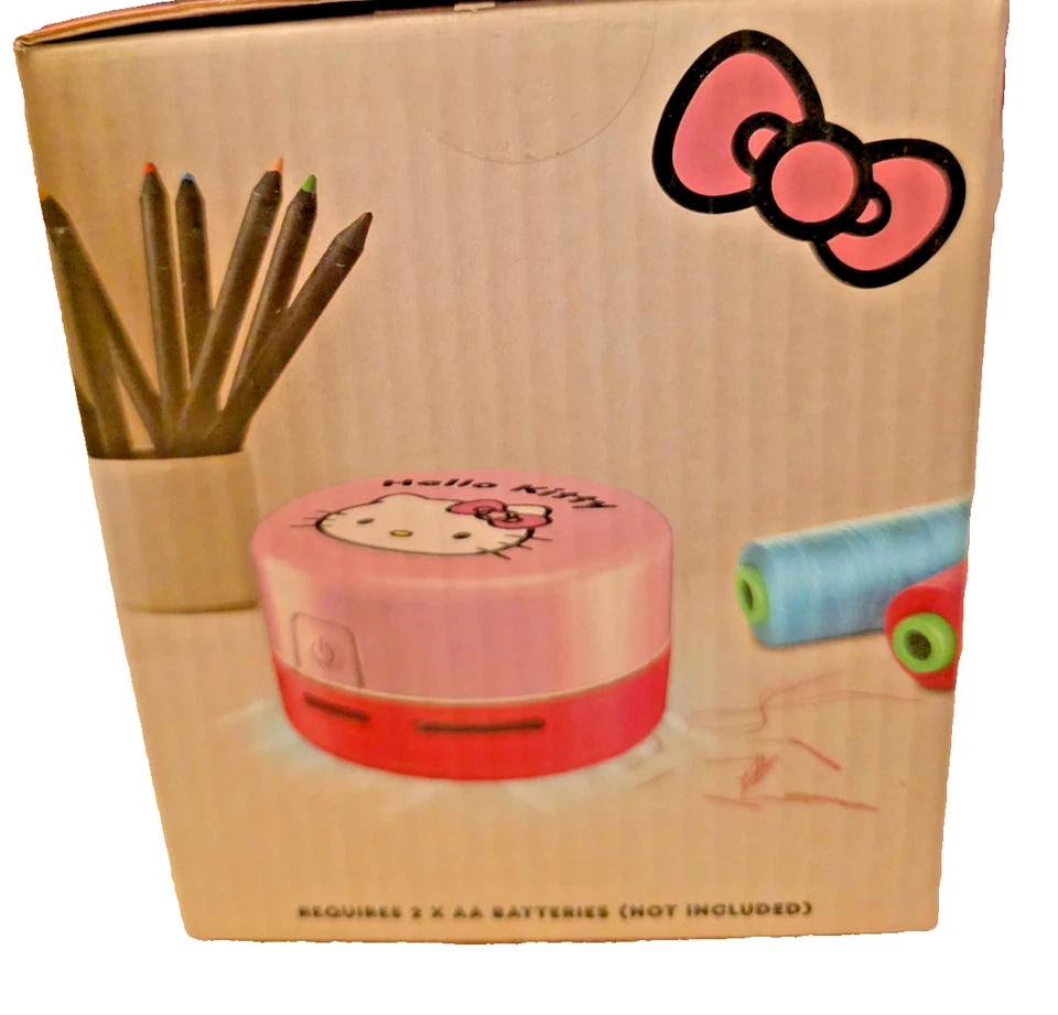 Mini aspiradora de escritorio Hello Kitty limpiador de migas lindo colector de polvo de escritorio nuevo regalo Foto 3 de 4