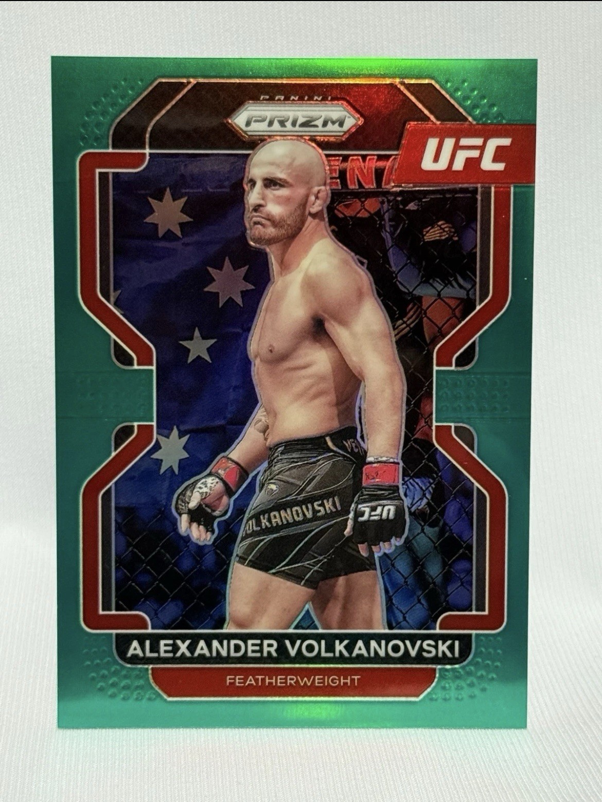 2022 Panini Prizm Alexander Volkanovski #147 TEAL Prizm 06/49