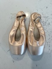 Used pointe shoes toe shoes worn by professional ballerina for crafts