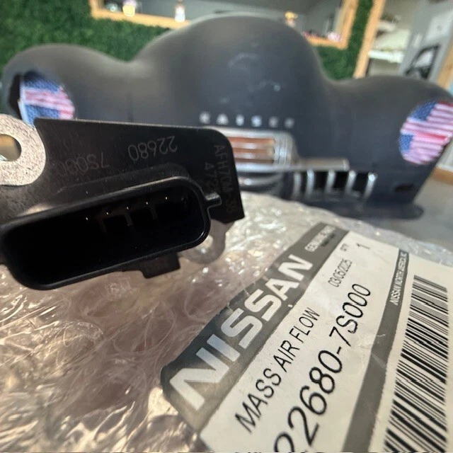 (1) Sensor de flujo de aire másico MAF genuino Nissan Infiniti 22680-7S000 igual que el distribuidor Foto 4 de 4