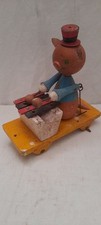 Jouet ancien a tirer en bois joueur de musique à restaurer 