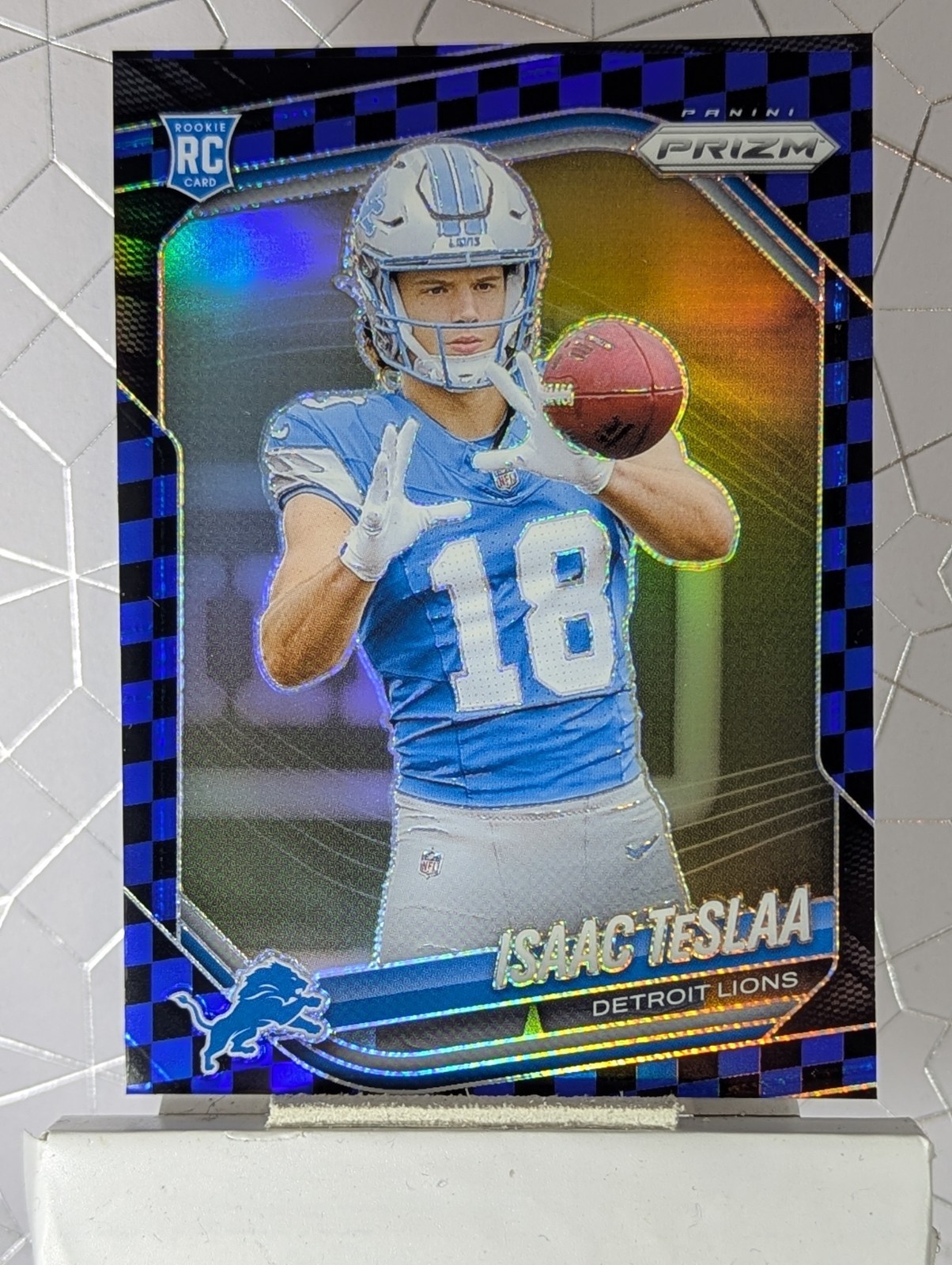 2025 Panini Prizm - Rookies Isaac Teslaa #316 Black & Blue Checker Prizm (RC)