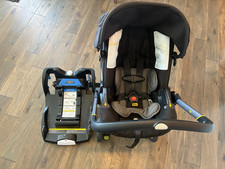 DOONA Infant Car Seat Nitro Black Stroller Car Seat - Comes with $180 LATCH BASE
