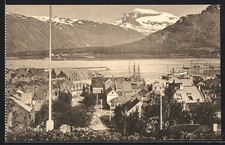 Postcard Tromso, town view against the river and the mountains 
