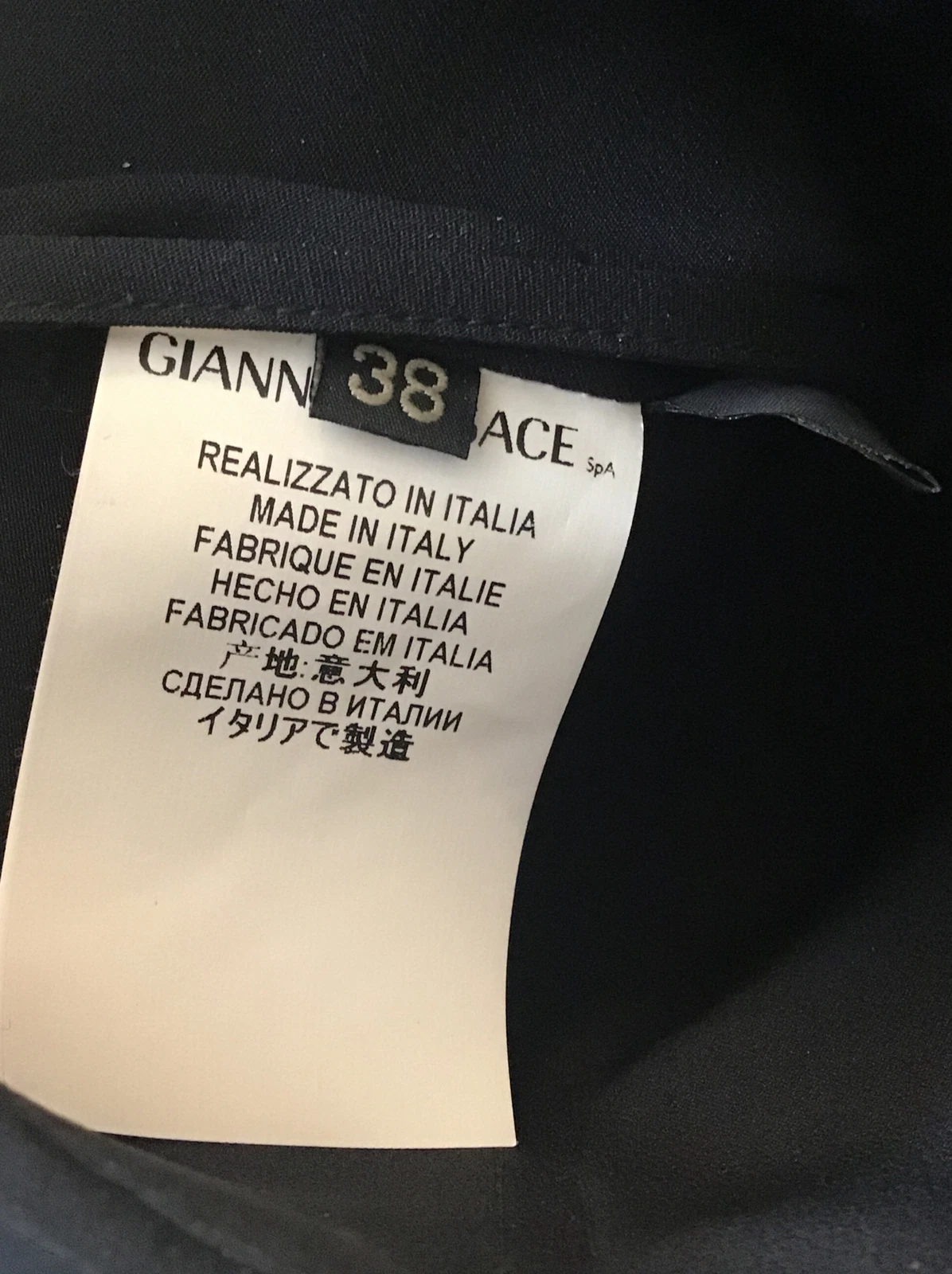 Abito Versace nero senza maniche pattinatore finiture in pelle collo a V orlo irregolare XS 38