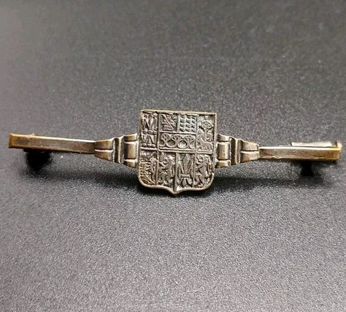 Broche - Pendentif Yves Saint Laurent Croix en métal argenté
