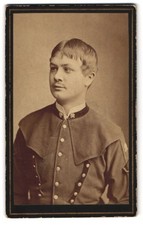 Fotografie Baker, Selmeczröl, junger Bergmann / Kumpel in Kluft mit schielendem 