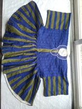 A Ghanaian male batakari traditionally handwoven with beautiful patterns.