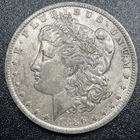 1886-O Morgan Silver Dollar $1 AU About Uncirculated