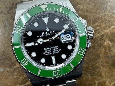 Rolex Submariner with Date Green Ceramic Bezel and Black dial Box Papers 2021