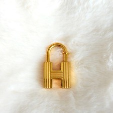 HERMES Candado Motivo H 2000 Bolso Tono Oro Ceniza Dije Llavero Accesorio para Mujer
