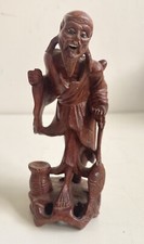 Chinese Hand Carving of a Traditional Fisherman