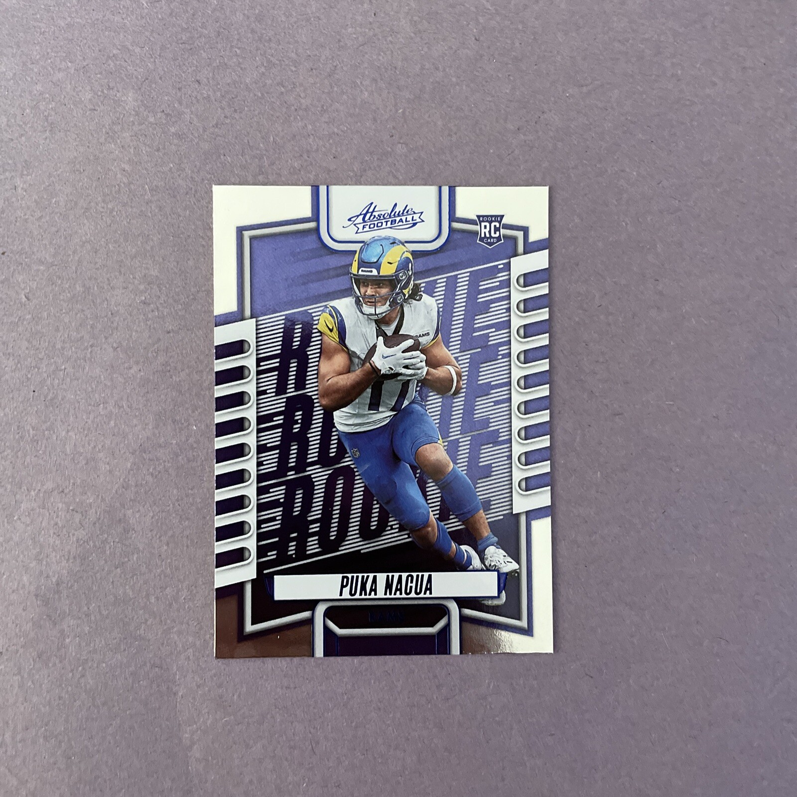 2023 Panini Absolute Rookies Blue Parallel Puka Nacua #189 Rookie RC