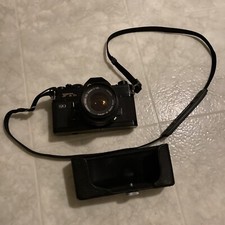 Canon FTb QL 35mm Film SLR Camera Silver Body With Canon 50 mm Lens case strap