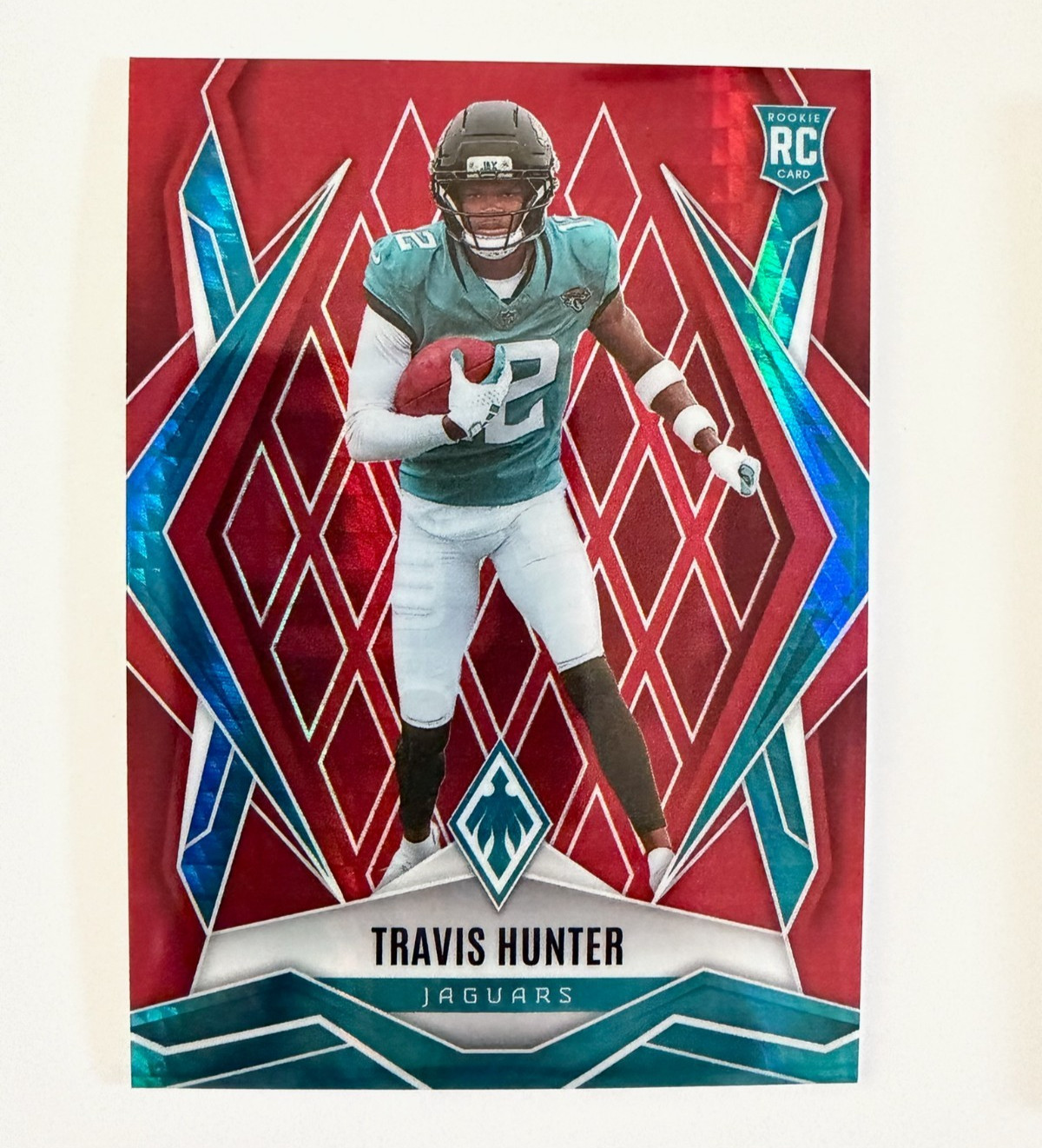 2025 Panini Phoenix - Rookies Travis Hunter #157 Red Hyper /399 (RC)