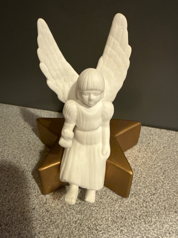 Bone China - Angel on star candle holder (Designed by Charles A. Berry)