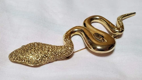 Bijou Christian Dior broche serpent pierre pavée dorée