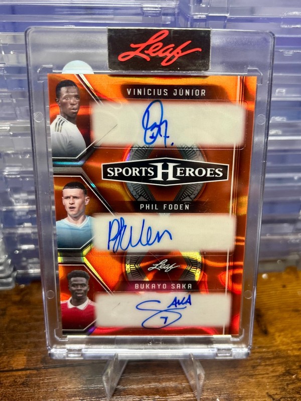 2025 Leaf Sports Heroes VINICIUS JUNIOR/PHIL FODEN/BUKAYO SAKA Auto Orange 1/1