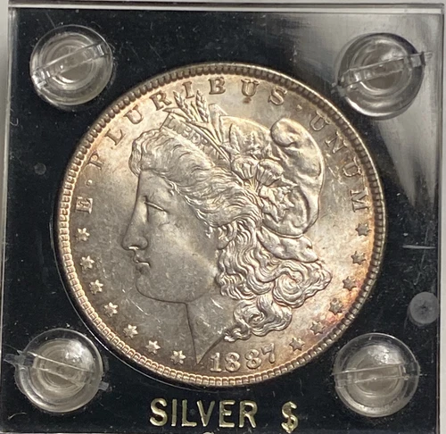 1887 Morgan Dollar- UNC  Grade - Nicely Toned On Both Surfaces. Awesome Coin