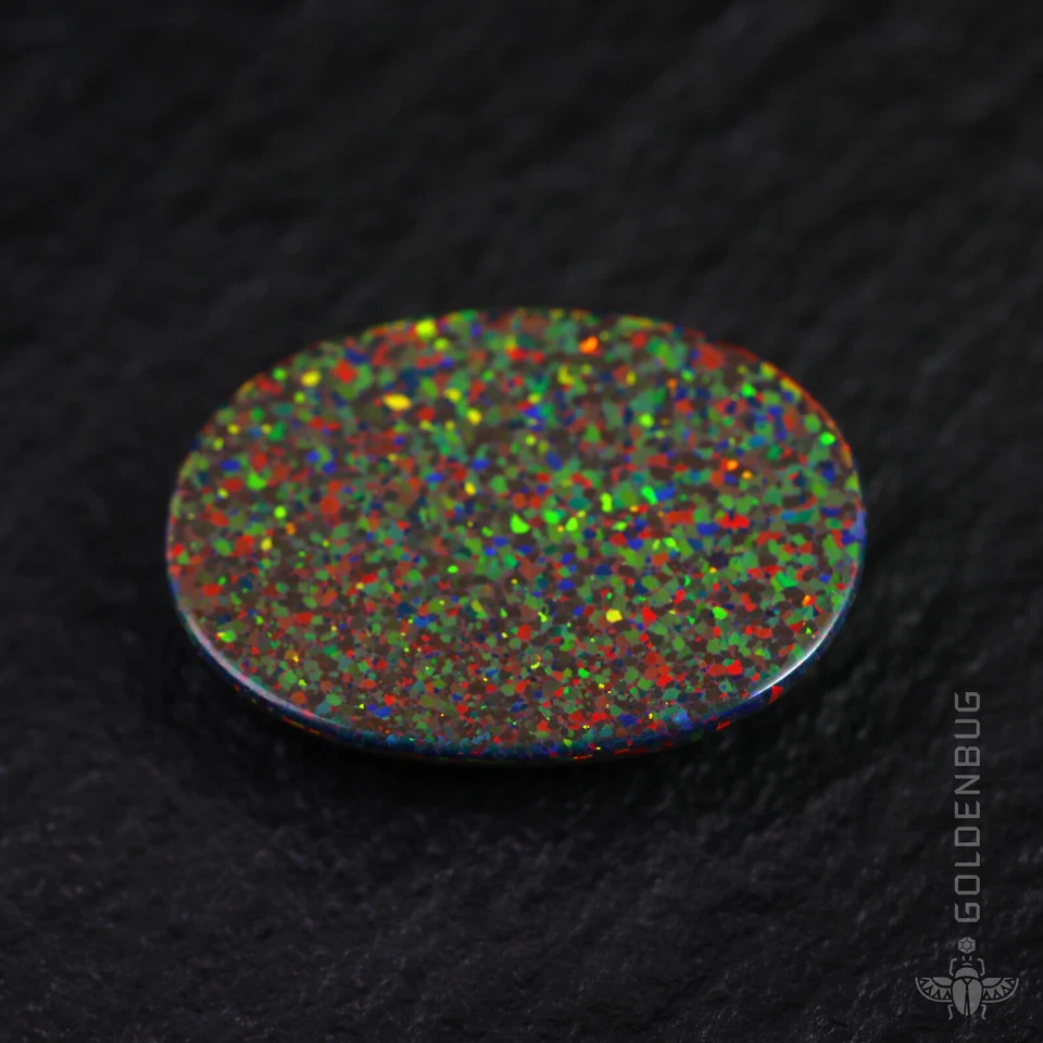 Ópalo de fuego negro cabina ovalada arco iris flash piedra 3D cultivada piedra preciosa suelta 10x14 mm, UE Foto 3 de 4