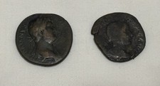 Two Roman Imperial bronze sestertius coins, possibly featuring Emperor Hadrian