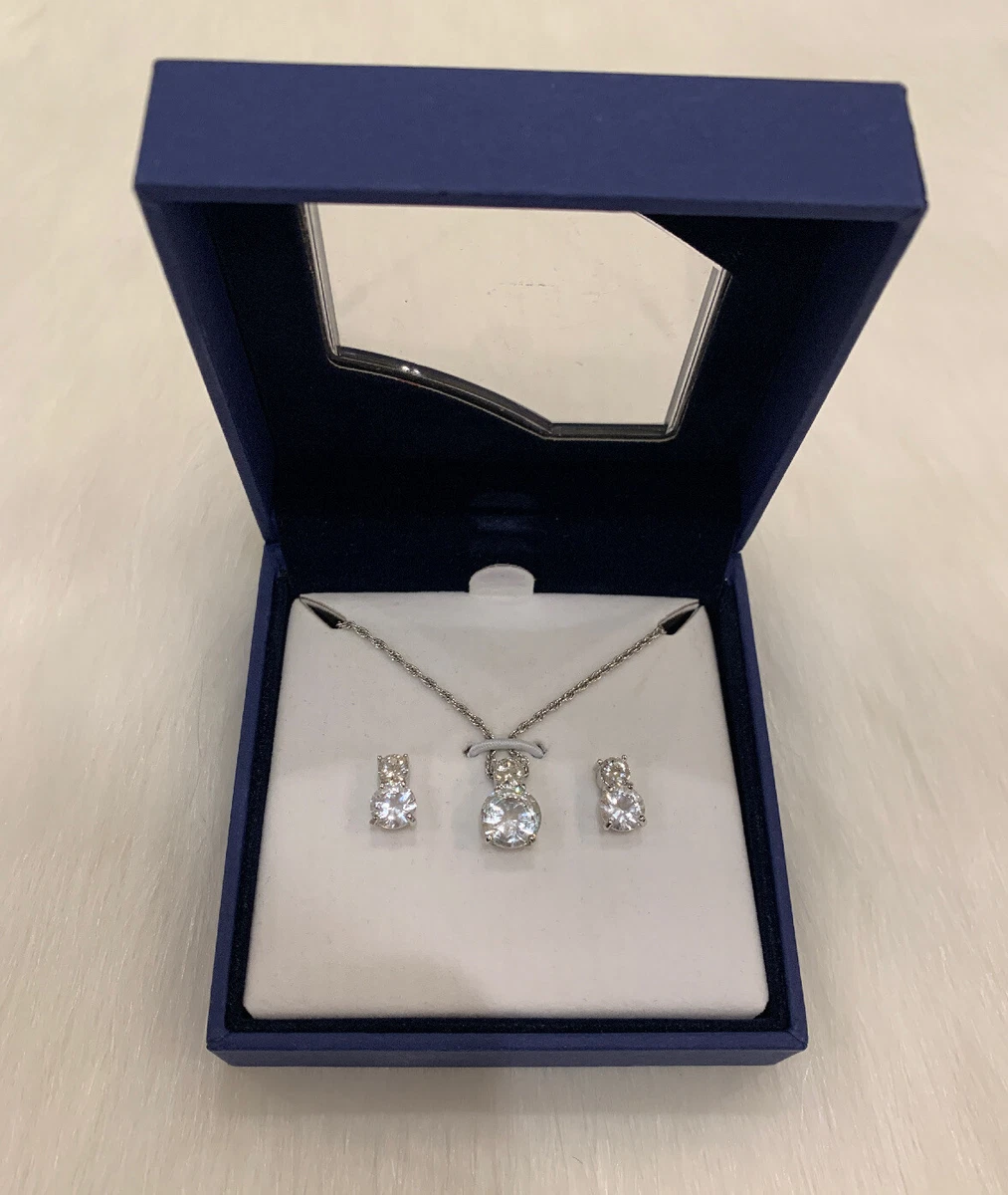 Solitaire double pierced earrings deals
