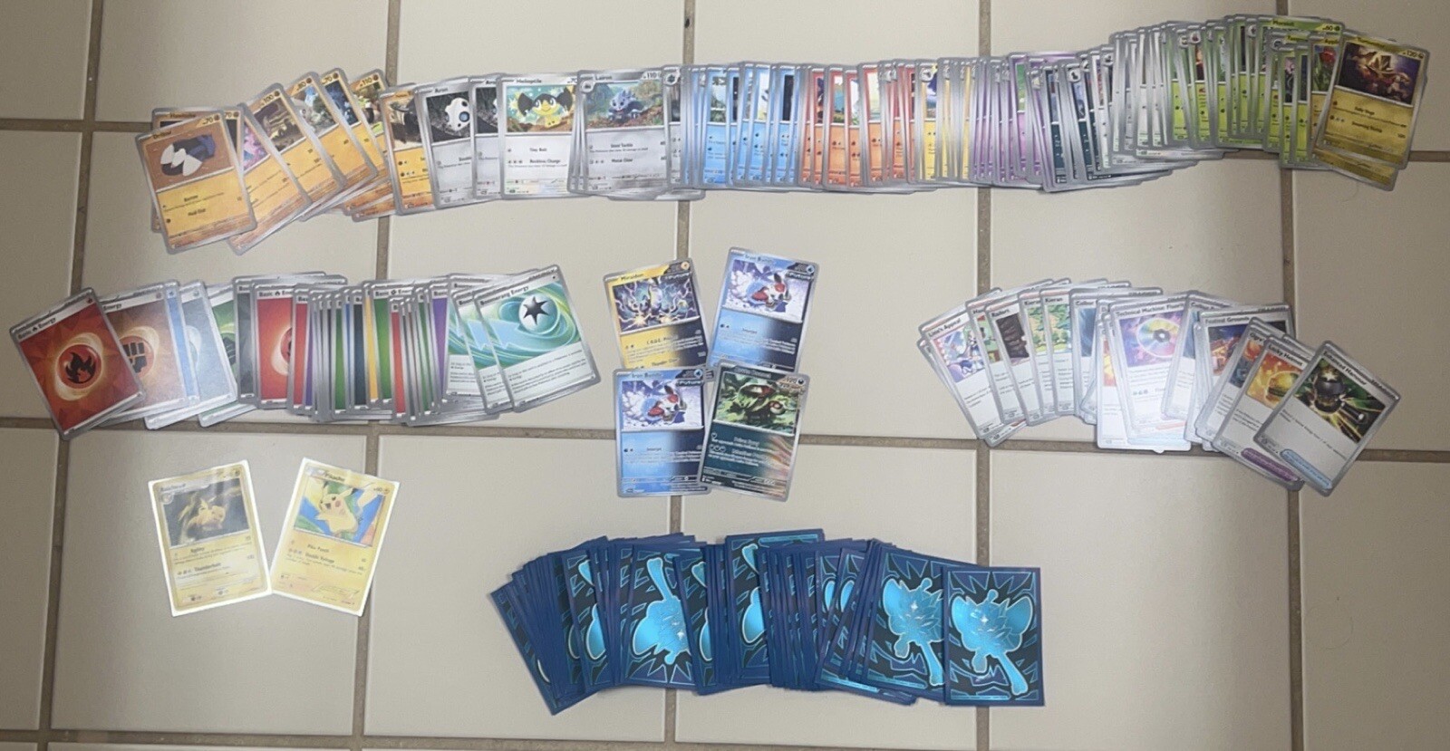 250 Piece Pokemon Lot. Uncommons, Trainers, Energies, Sleeves