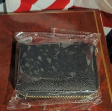 Black Zip-Around Wallet with Zipper Accent and Card Slots