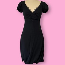 Vintage Moschino little black dress in pure silk with a soft drape.