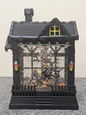 RAZ 10'' Haunted House Witch on Bike in Water Glitter Lights & Sounds Halloween