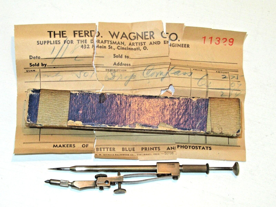 A pre-WWI German brass drafting set for cartographers — tiny precision instruments in a fitted case that feel like they belong to a Victorian map-maker.