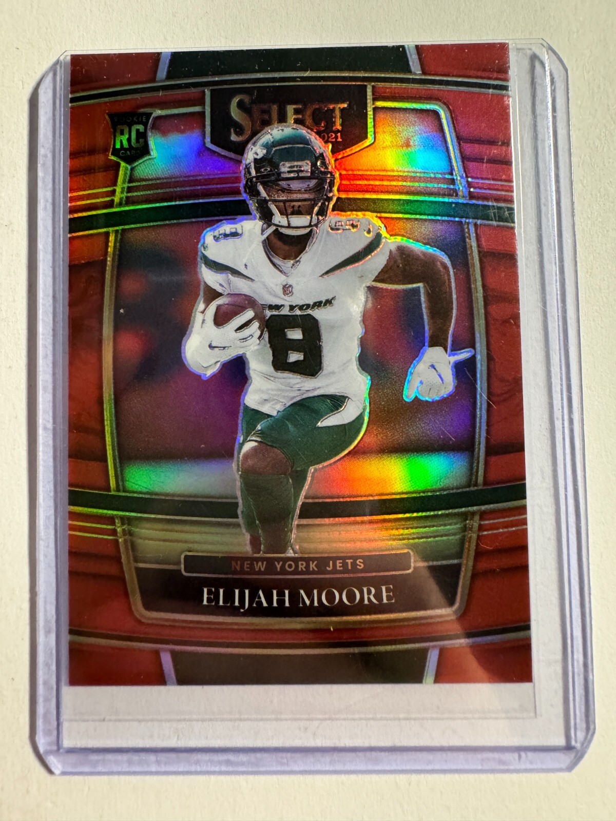 K147,358 - 2021 Select Prizm Red #56 Elijah Moore #/99