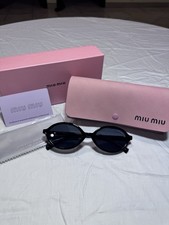 Miu Miu Women's Oval Black Sunglasses Tinted Lenses