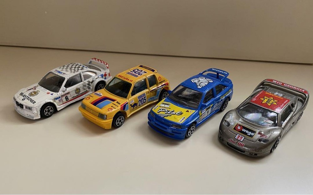 set of 4 burago miniature cars