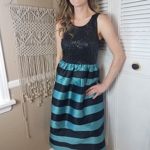 black and green sequin dress